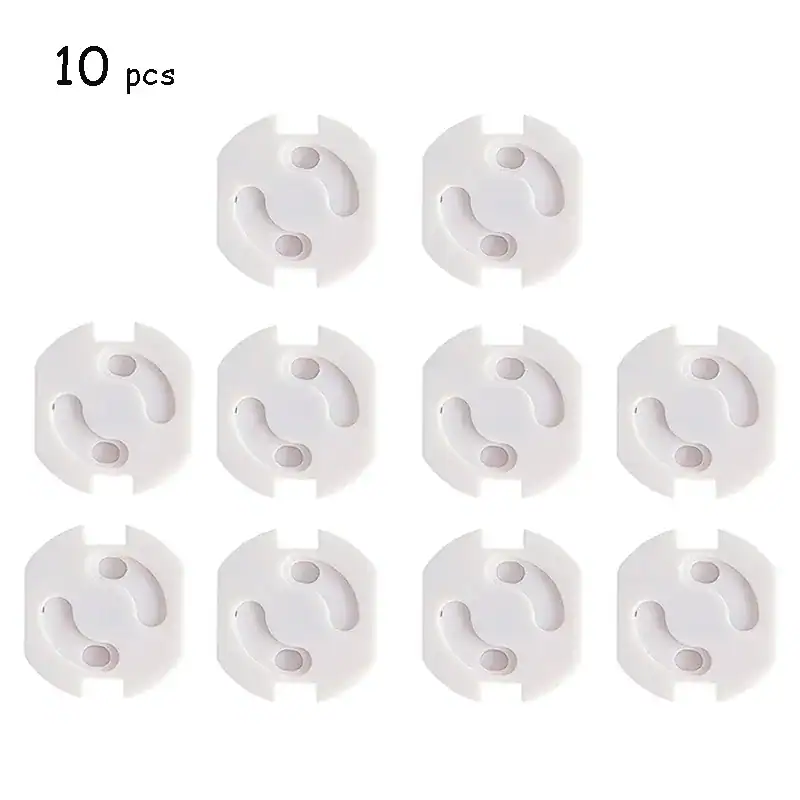 עשרה כיסויי שקע עגולים לבנים המסודרים בדוגמת רשת על רקע רגיל. לכל מכסה עיצוב בטיחותי פשוט עם שני חורים קטנים. בטקסט בצד שמאל למעלה כתוב "10 יח'.